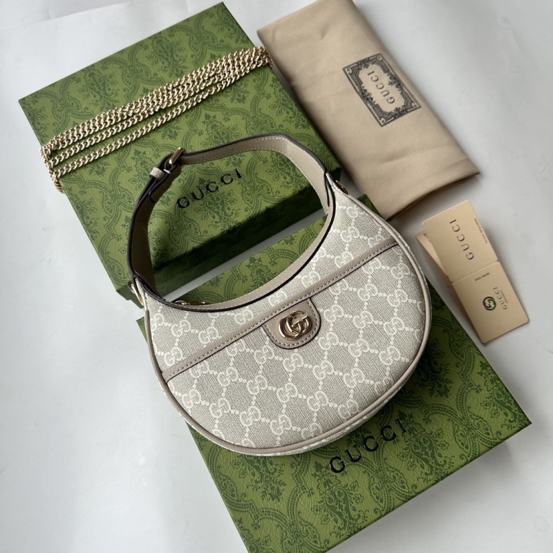 G*u*i top handle bags